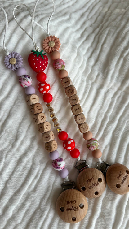 Attache tétine à thème