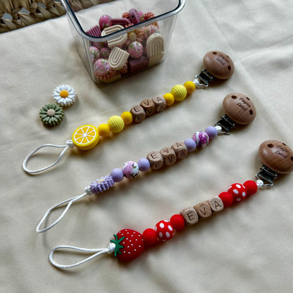 Attache tétine à thème