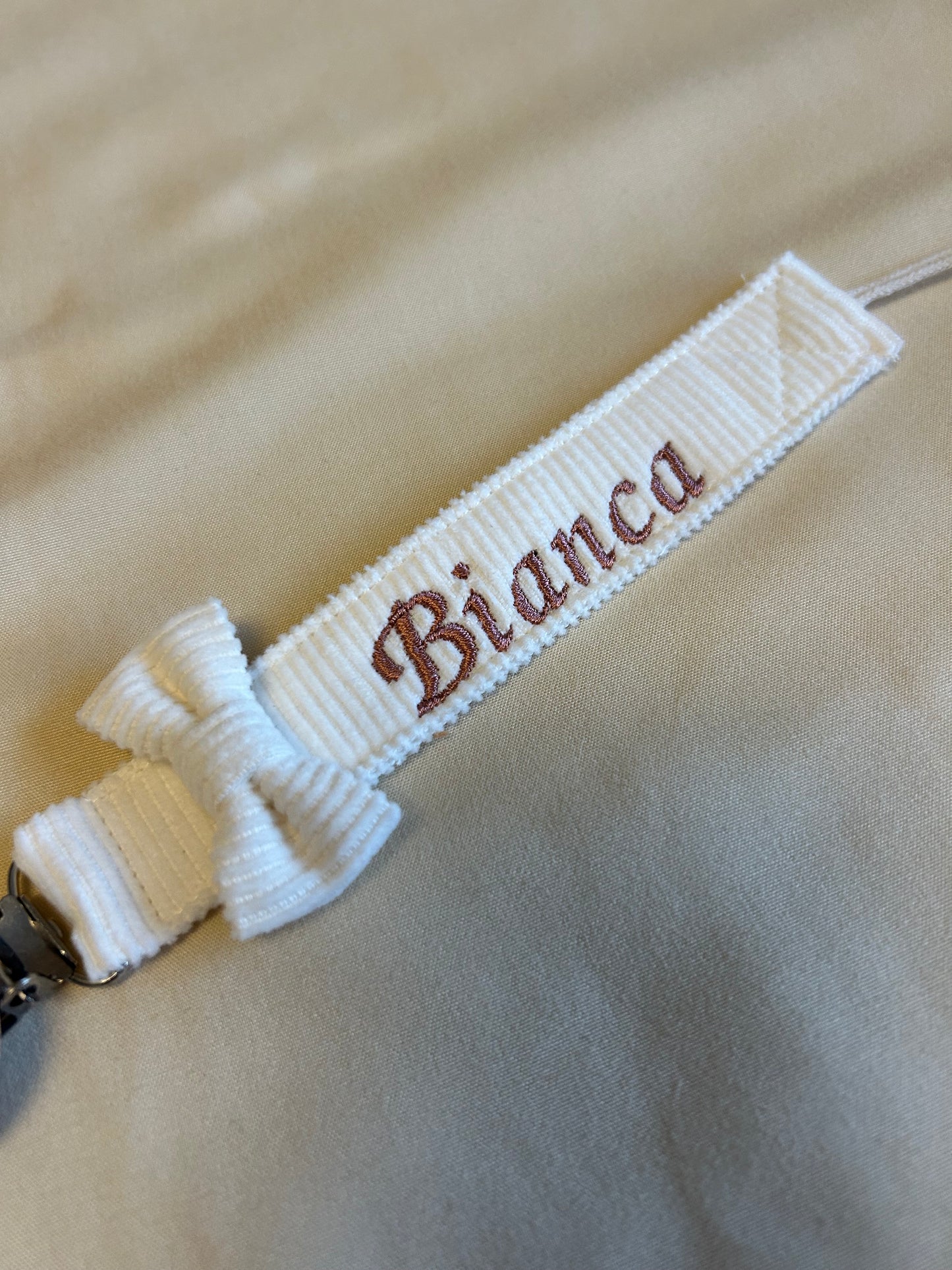 Attache tétine en velours